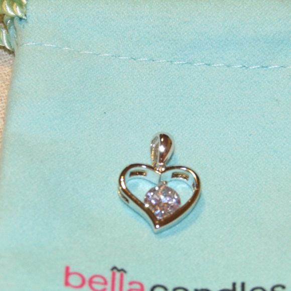 Jewelry - New in bag silver heart shape pendant and sone